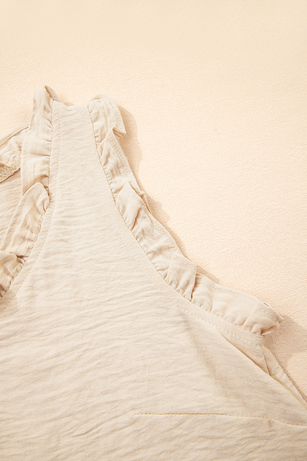 Parchment Textured Frilly Trim V Neck Sleeveless Top