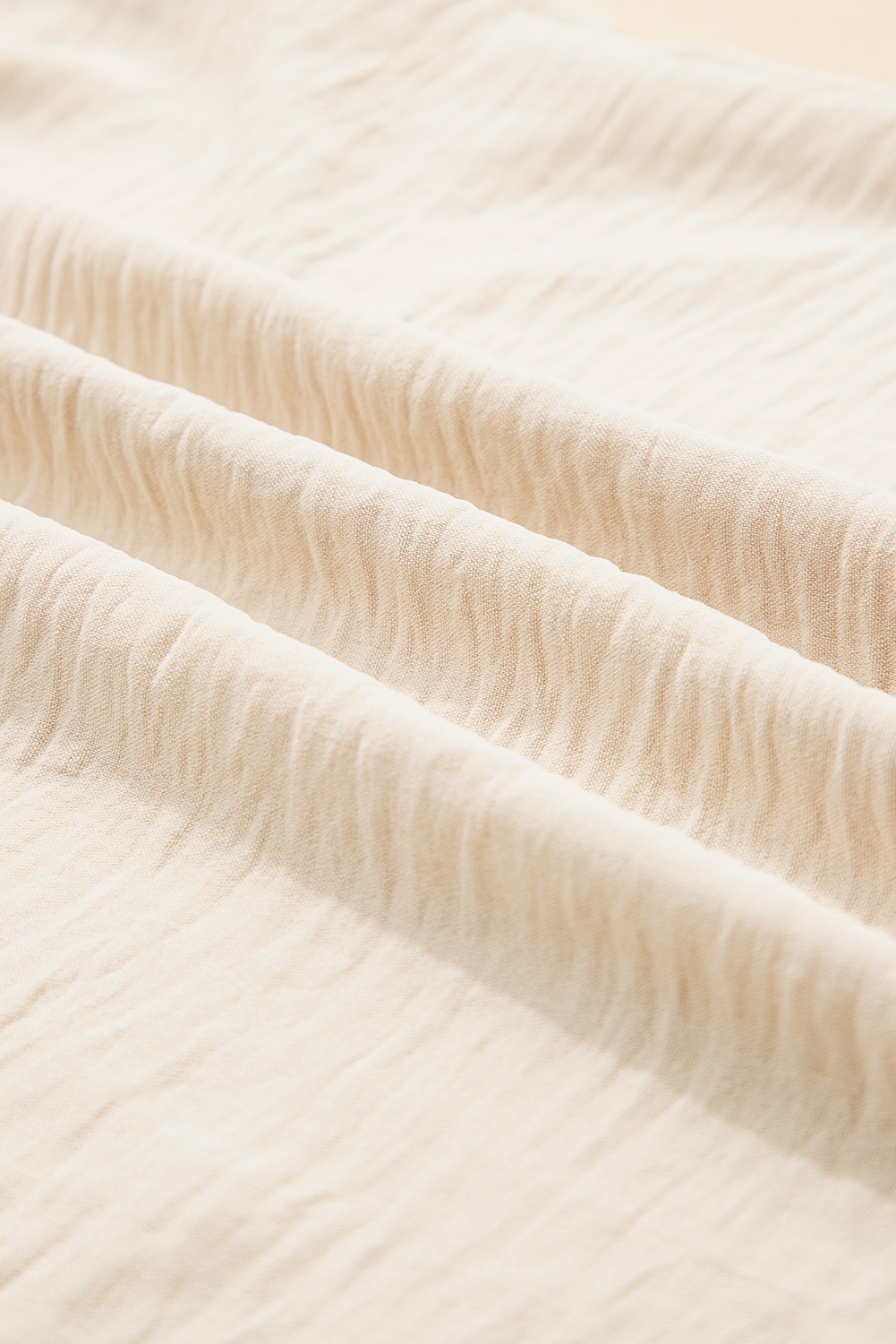 Parchment Textured Frilly Trim V Neck Sleeveless Top