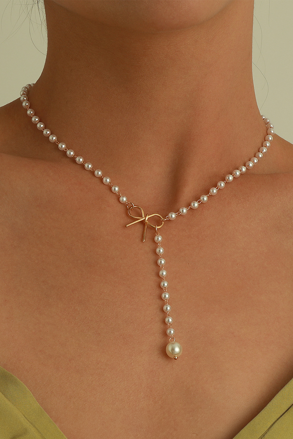 Gold Plated Bow Decor Pearl Chaining Necklace