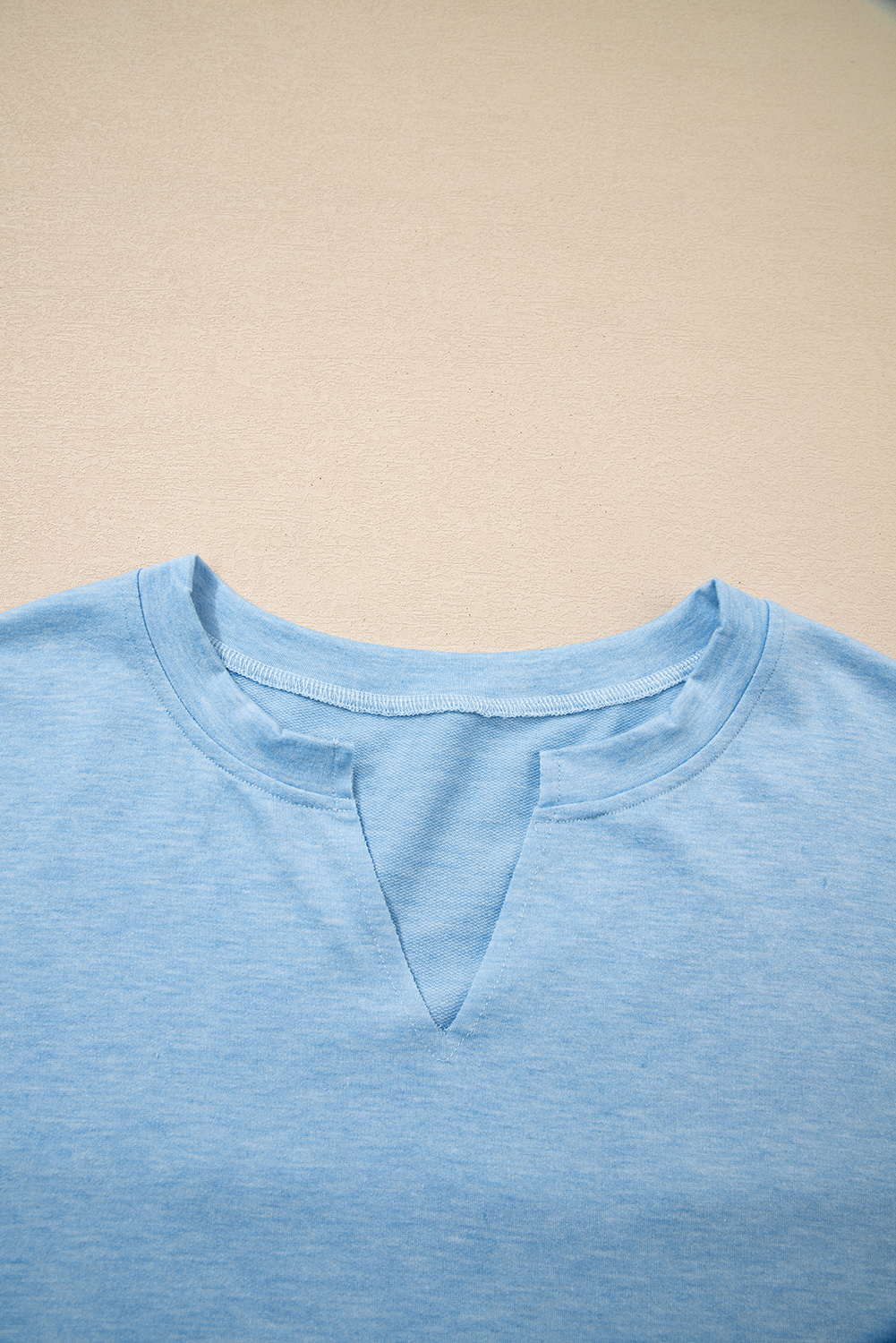 Myosotis Notched Neck Terry Raw Hem Long Sleeve Top