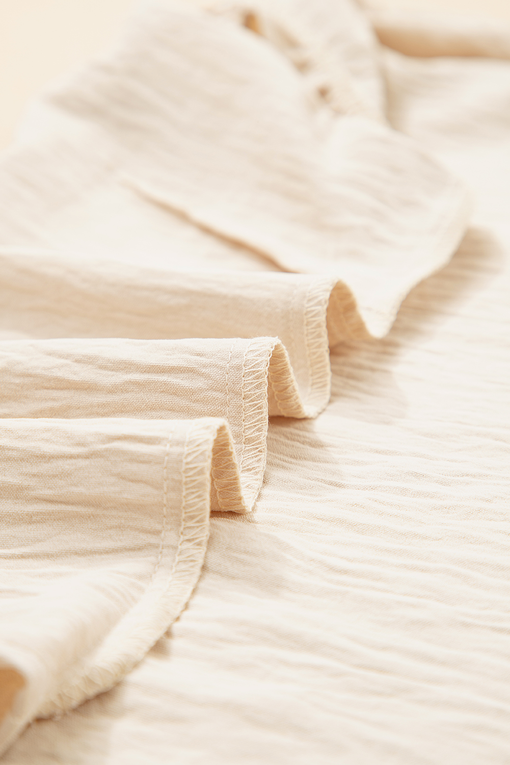 Parchment Textured Frilly Trim V Neck Sleeveless Top