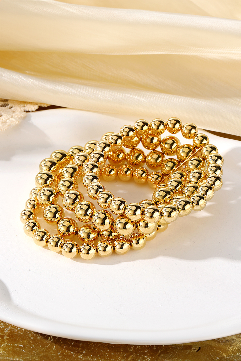 Gold Multi Layered Plated Alloy Beaded Elastic Bracelet