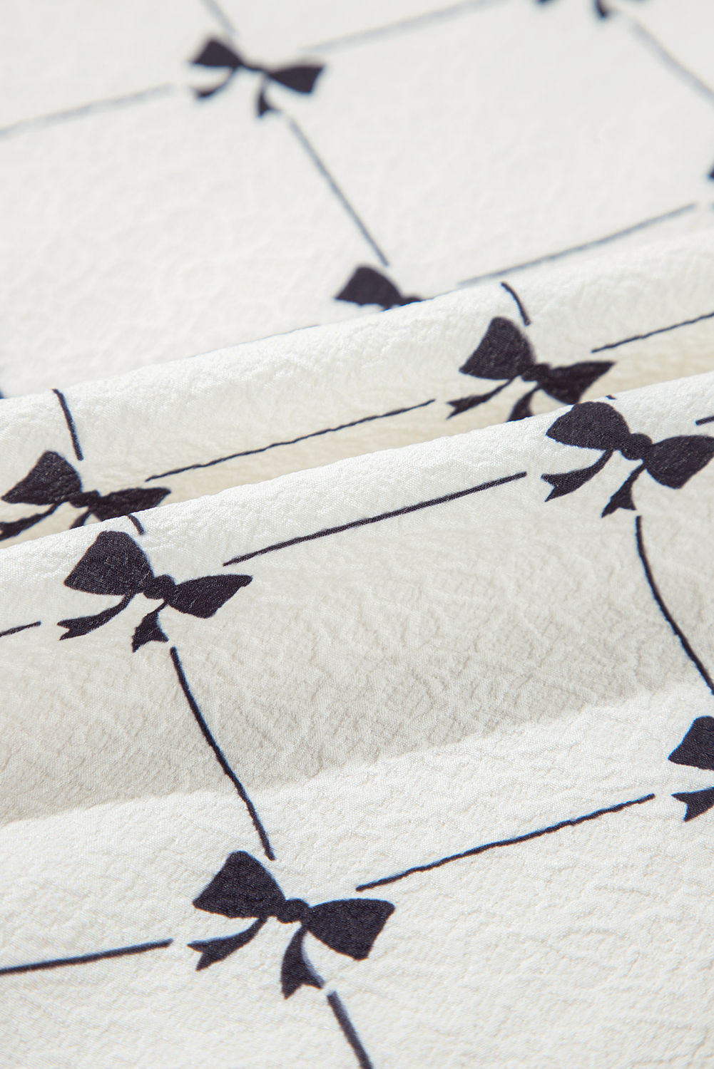 White Bowknot Print Front Knots Bubble Sleeve Blouse