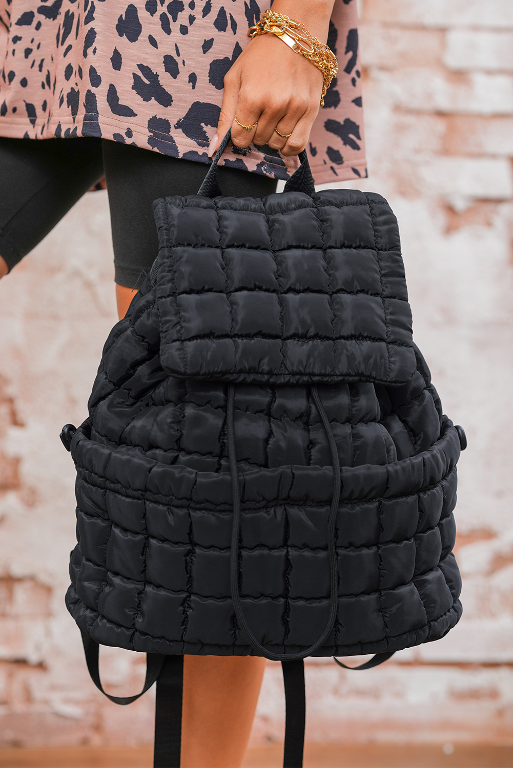 Black Solid Flapped Quilted Puffer Backpack